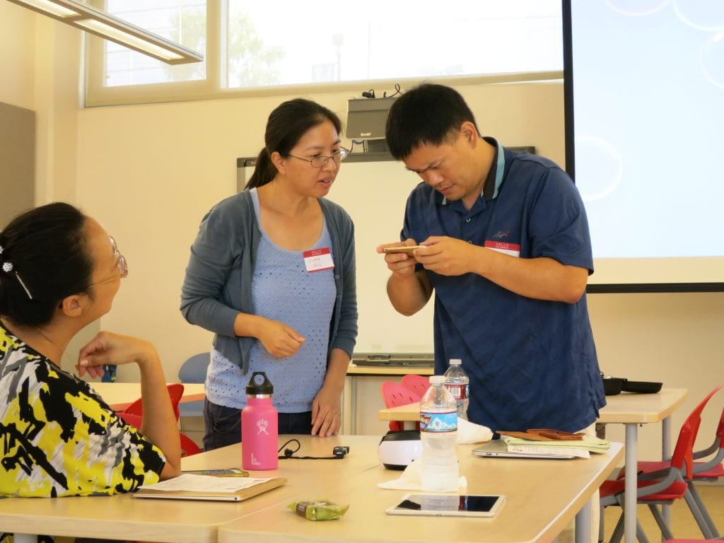 Tech It Out Day faculty looking at swivl